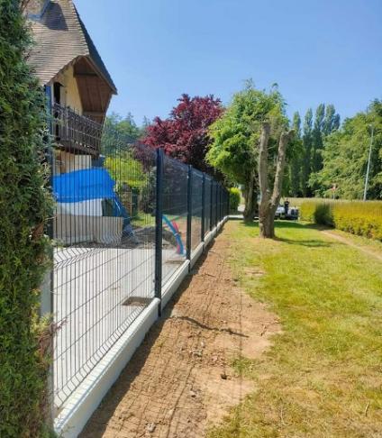 Avant/Après d'une clôture par l'entreprise CNE près de Rouen